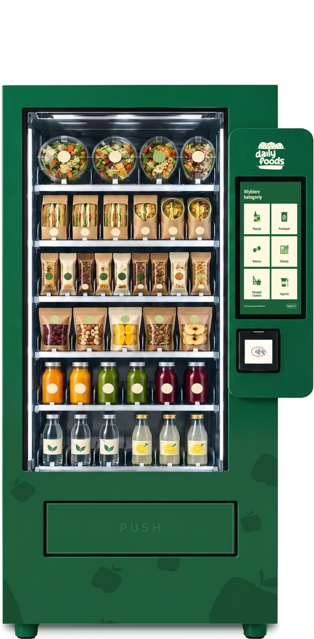 Automat DailyFoods w oklejeniu z wzorem jabłek: dwie górne półki z posiłkami, dwie środkowe z przekąskami, dwie dolne z napojami